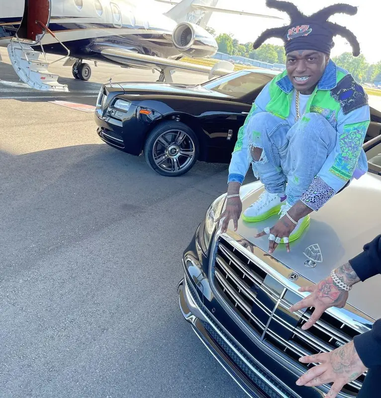 Kodak Black outfit in Versace, Alexander McQueen, and Louis Vuitton, 2021