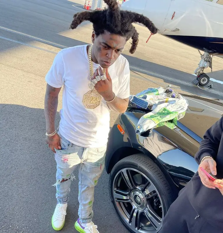 Kodak Black outfit in Versace, Alexander McQueen, and Louis Vuitton, 2021