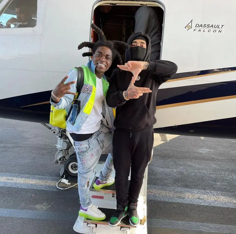 Kodak Black outfit in Versace, Alexander McQueen, and Louis Vuitton, 2021