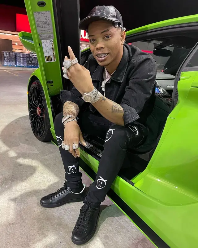 Lil Migo outfit in Supreme, Don't Let Mom Find Out, and Gucci, 2021