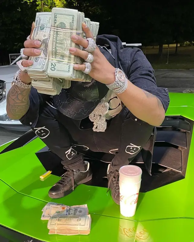 Lil Migo outfit in Supreme, Don't Let Mom Find Out, and Gucci, 2021