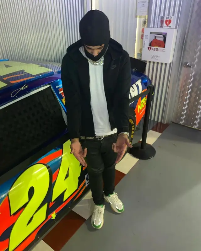 Smokepurpp outfit in Nike, Amiri, and Gucci, 2021