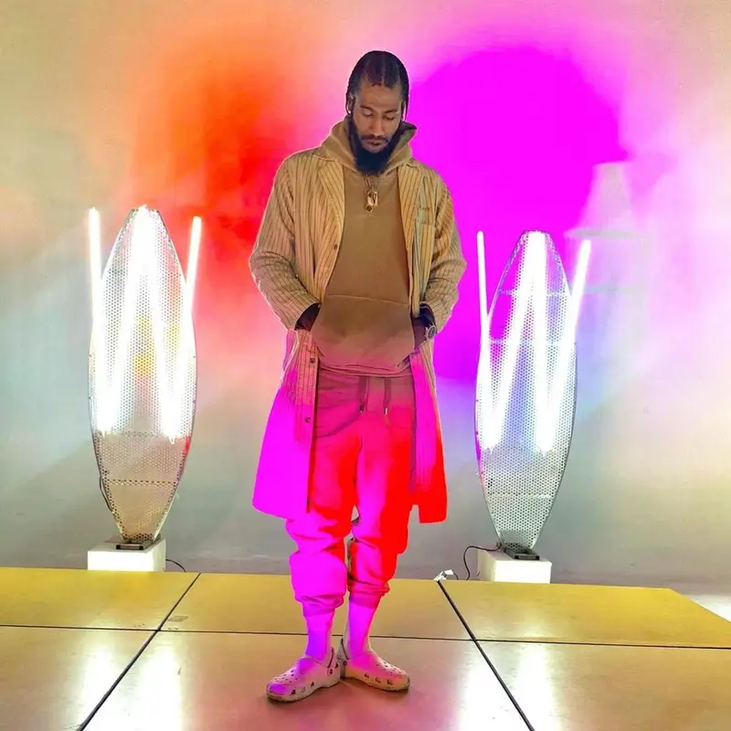 Iman Shumpert outfit in Human Made, Dolce & Gabbana, and John Geiger, 2021