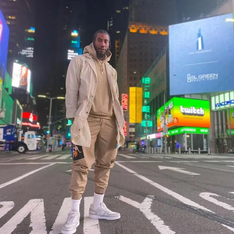 Iman Shumpert outfit in Human Made, Dolce & Gabbana, and John Geiger, 2021