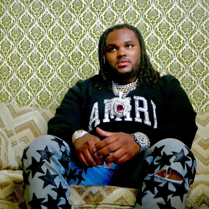 Tee Grizzley outfit in Amiri, Chemist, and Nike, 2021