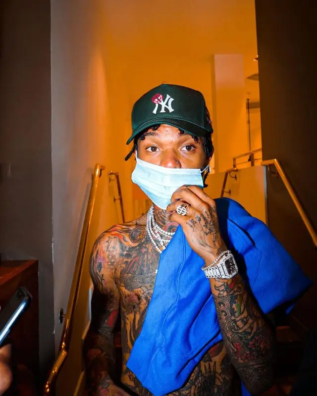 Swae Lee outfit in Purple Brand, B.B. Simon, and Ethika, 2021