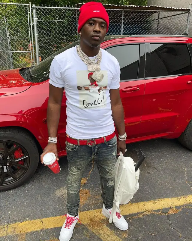 Bankroll Freddie outfit in Gucci, Supreme, and New Era, 2021
