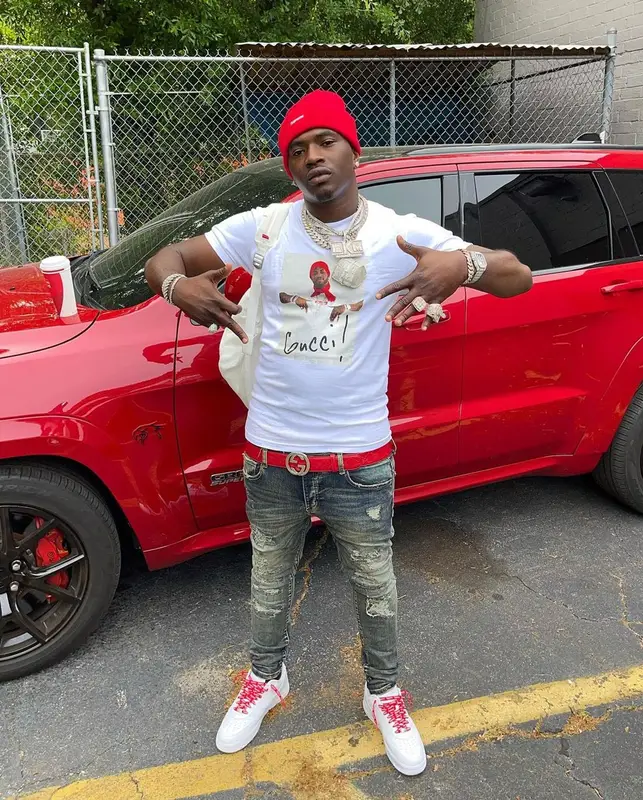Bankroll Freddie outfit in Gucci, Supreme, and New Era, 2021