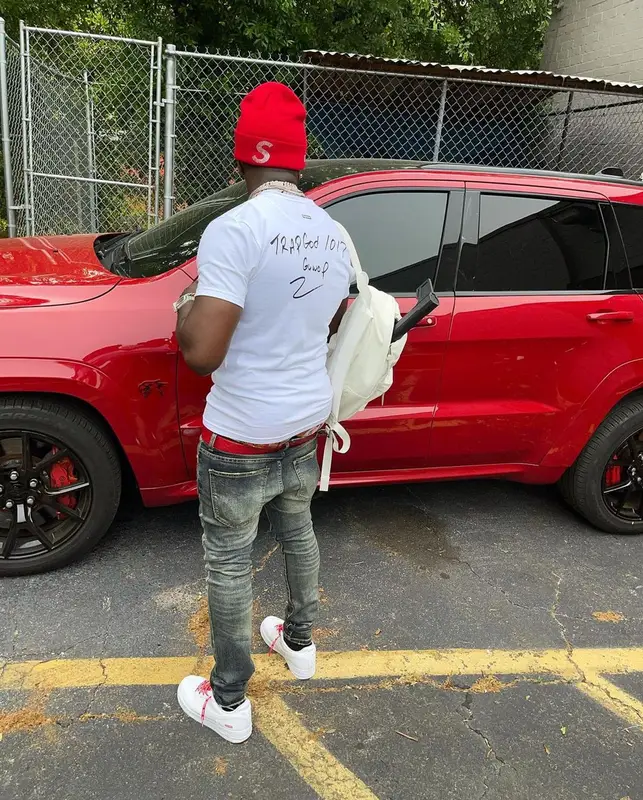 Bankroll Freddie outfit in Gucci, Supreme, and New Era, 2021