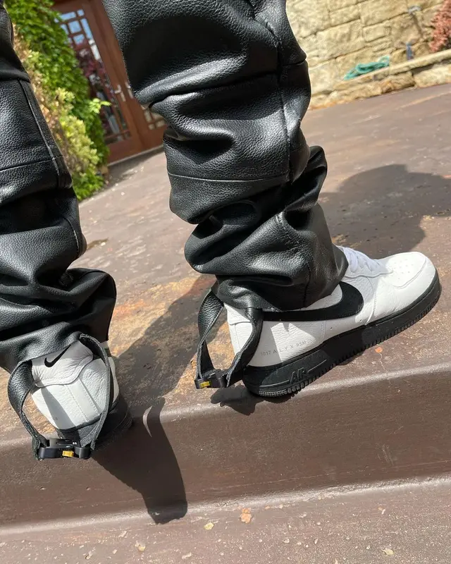 Shai outfit in Chanel and Nike, 2021