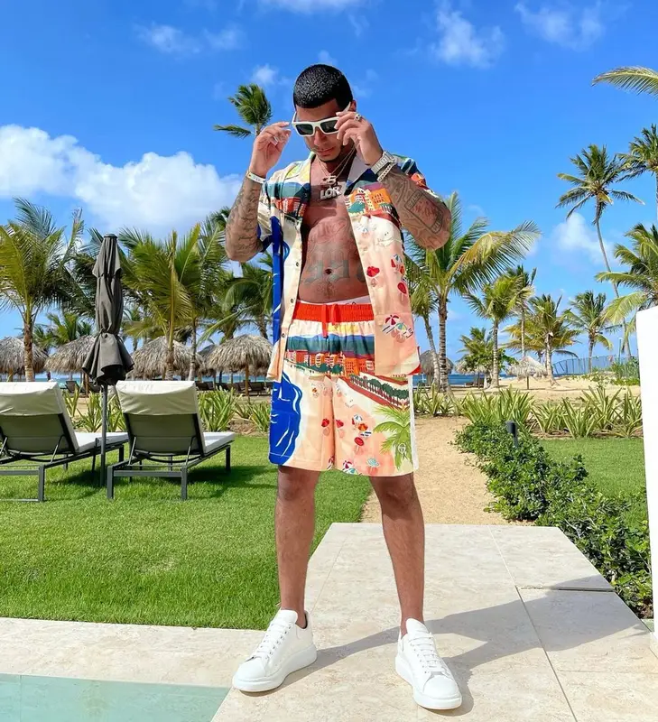 CJ outfit in Sergio Tacchini, Alexander McQueen, and Prada, 2021