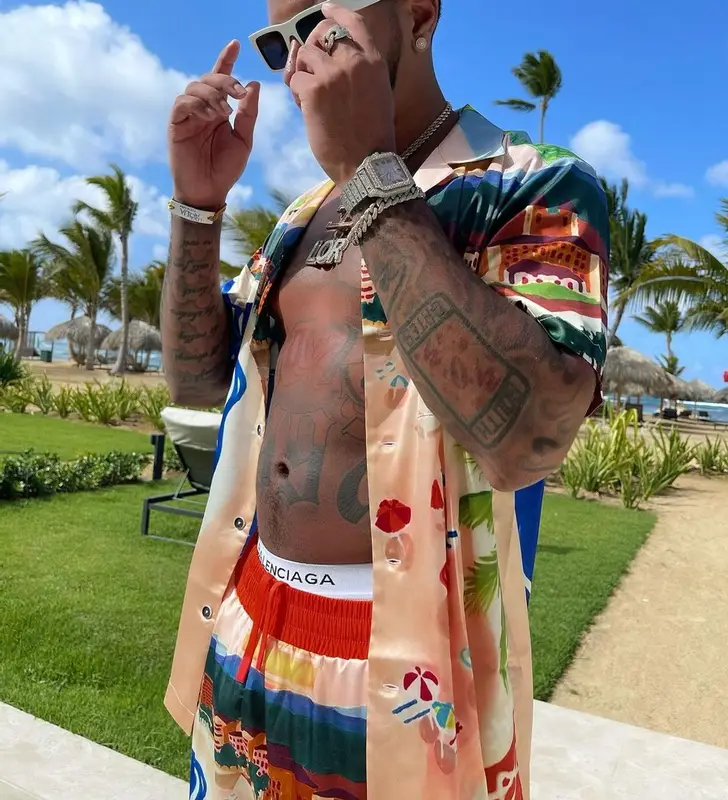 CJ outfit in Sergio Tacchini, Alexander McQueen, and Prada, 2021