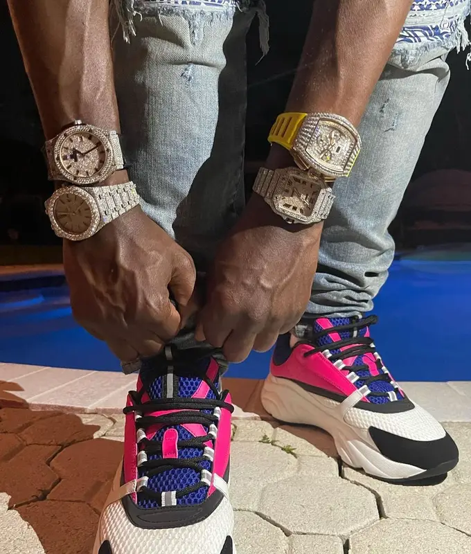 Lil Tjay outfit in Dior, Amiri, and Kenny Scharf, 2021