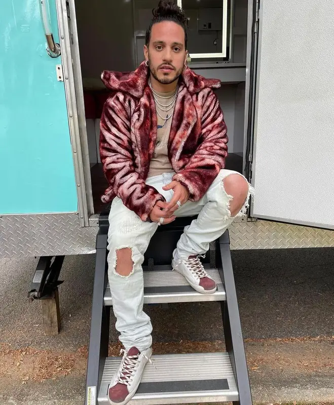 Russ outfit in KidSuper, Purple Brand, and Golden Goose, 2021