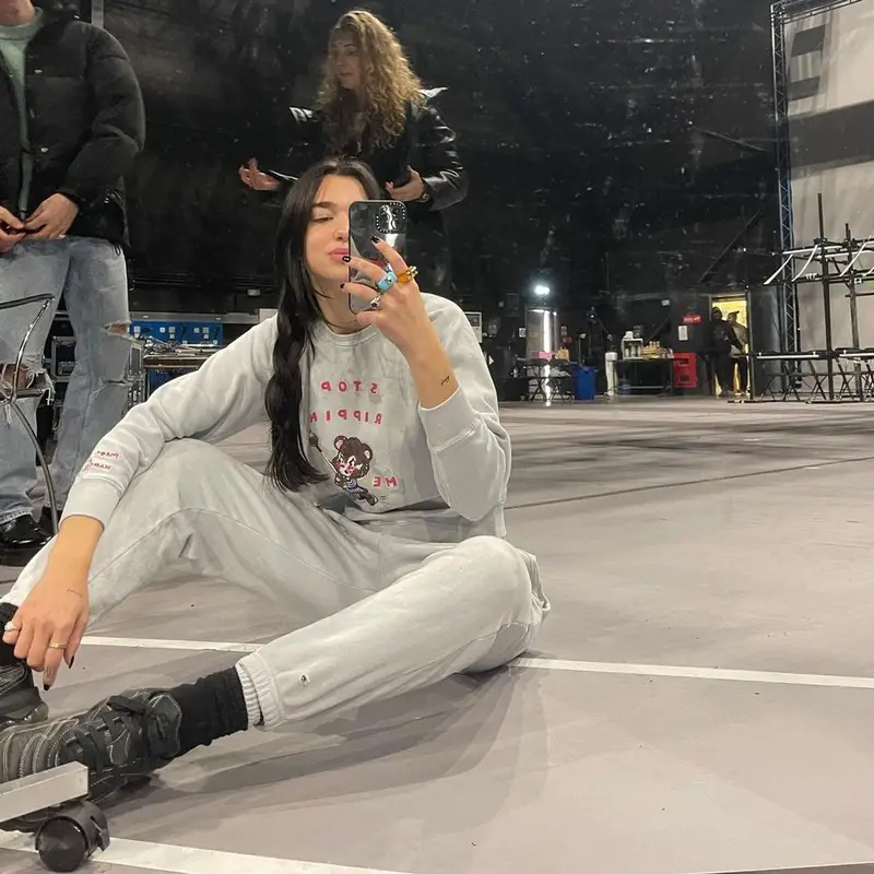 Dua Lipa outfit in Marc Jacobs, Puma, and Magda Archer, 2021