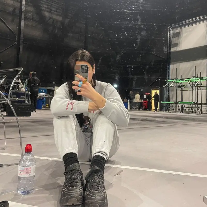 Dua Lipa outfit in Marc Jacobs, Puma, and Magda Archer, 2021