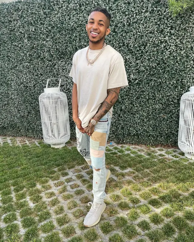 DDG outfit in Fear of God, Amiri, and Yeezy, 2021