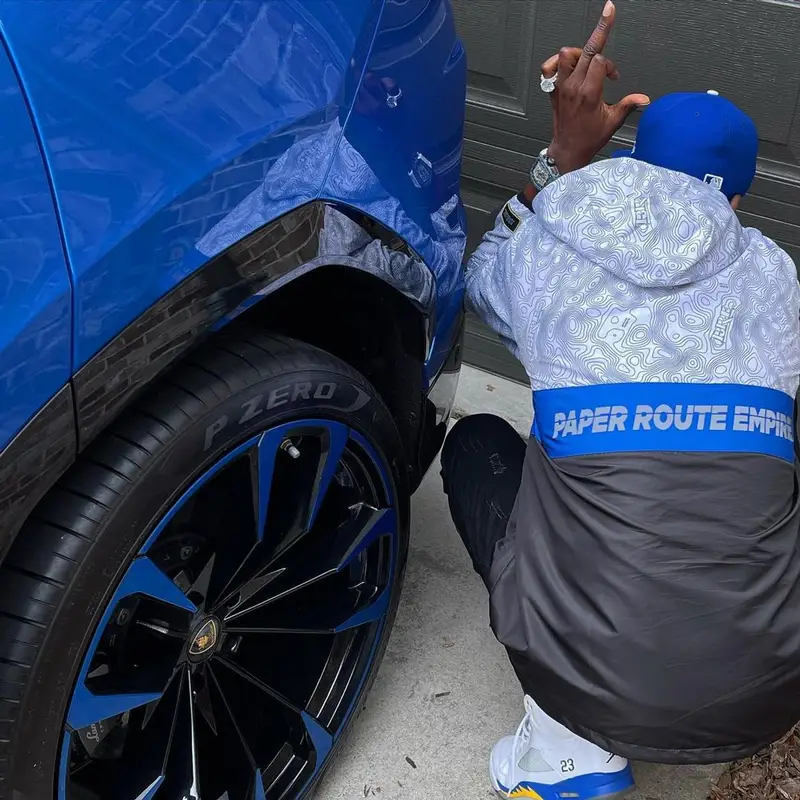 Young Dolph outfit in Young Dolph Merch, Jordan, and New Era, 2021