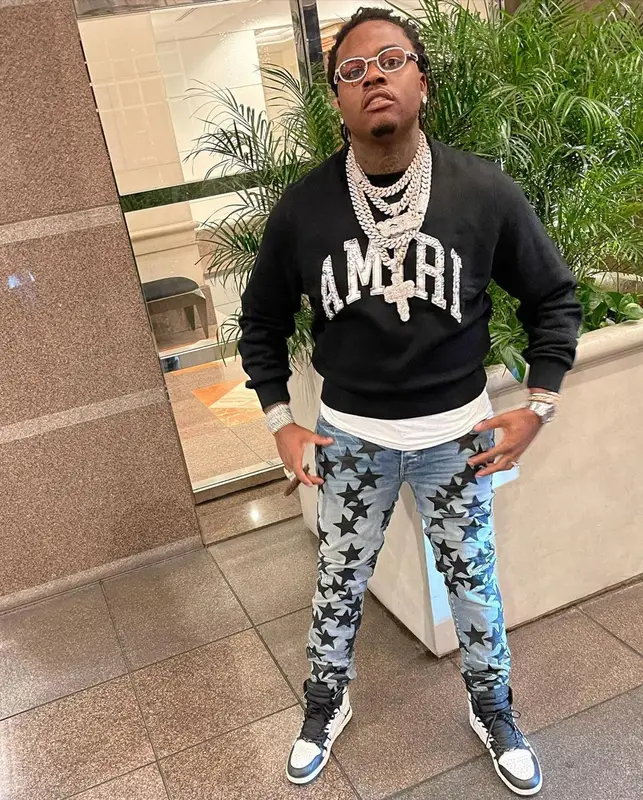 Gunna outfit in Amiri, Chemist, and Cartier, 2021