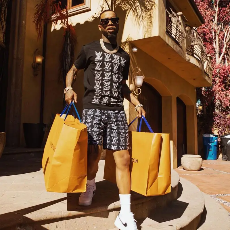 Tory Lanez outfit in Nike and Louis Vuitton, 2021