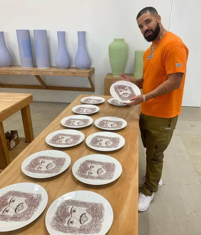 Drake outfit in World Industries, Undercover, and Nike, 2021