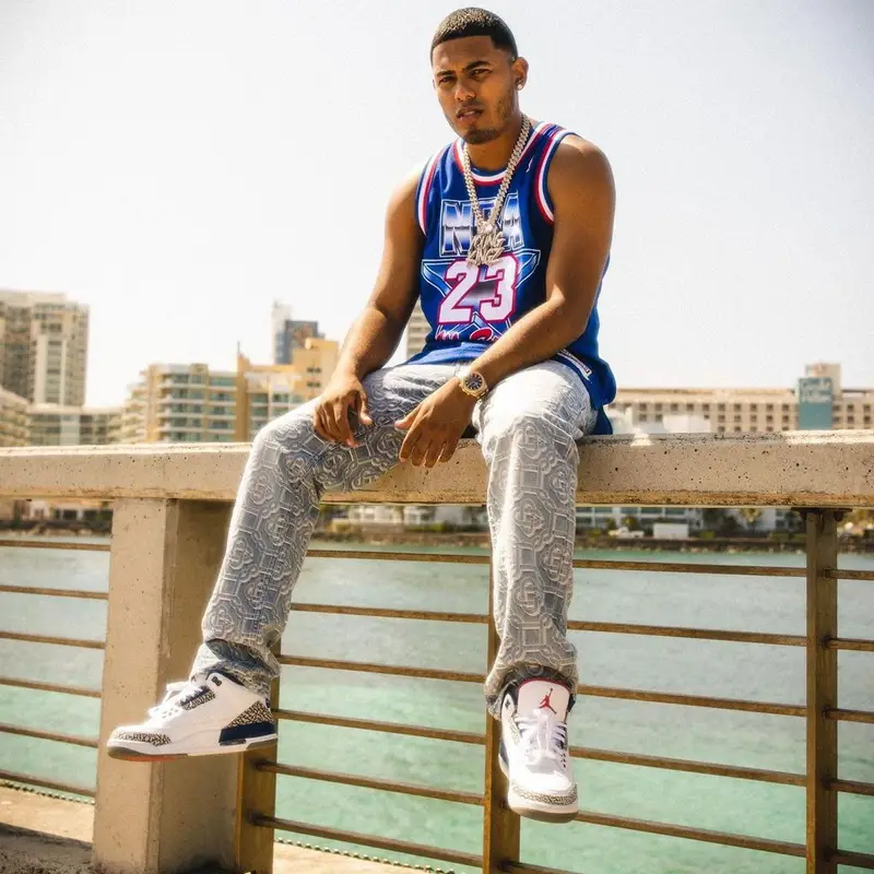 Myke Towers outfit in Mitchell & Ness, Casablanca, and Jordan, 2021