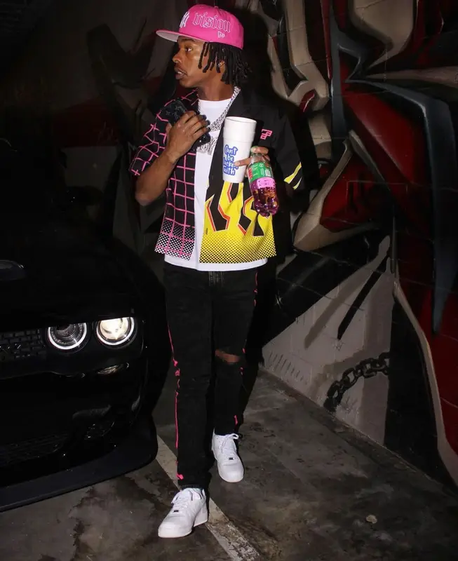 Lil Baby outfit in Prada, Amiri, and Nike, 2021