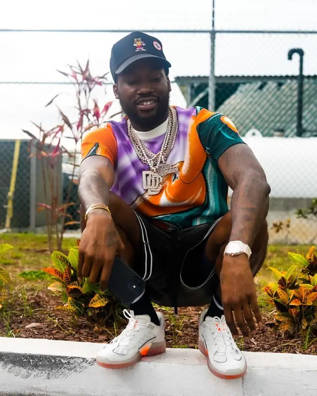 Meek Mill outfit in Dior, Amiri, and Louis Vuitton, 2021