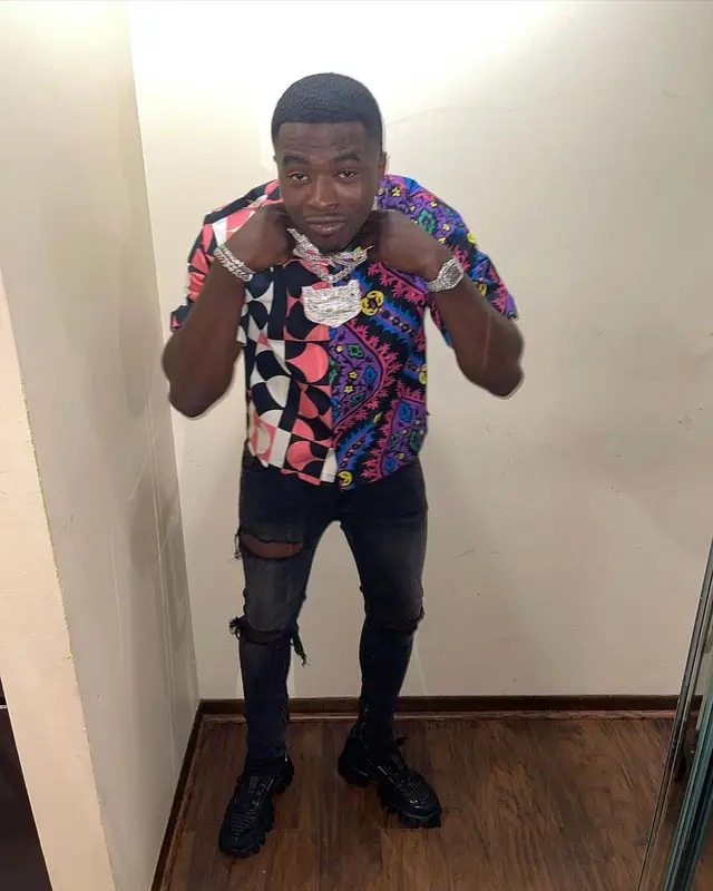 Bankroll Freddie outfit in Moncler, Prada, and Cartier, 2021