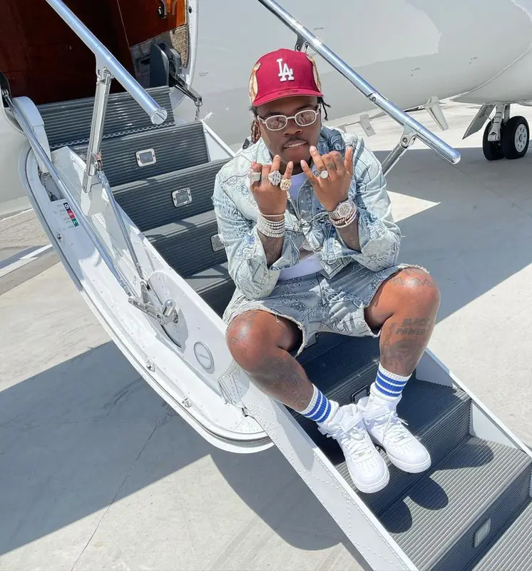 Gunna outfit in Amiri, Cartier, and Jon Stan, 2021