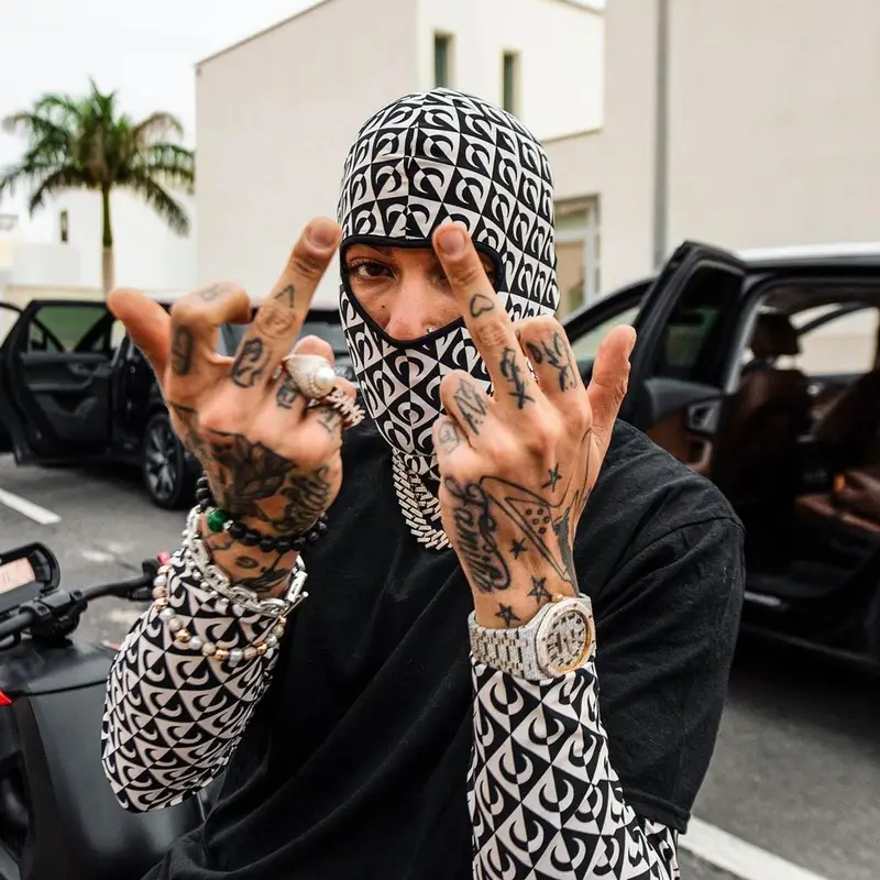 Sfera Ebbasta outfit in Marine Serre, Amiri, and Enterprise Japan, 2021