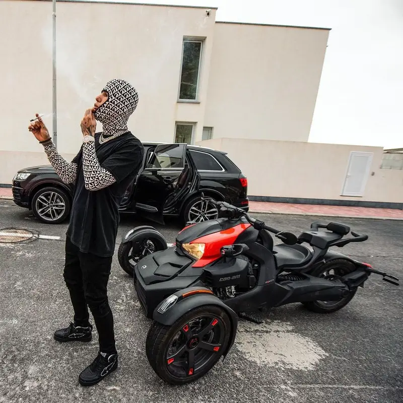Sfera Ebbasta outfit in Marine Serre, Amiri, and Enterprise Japan, 2021