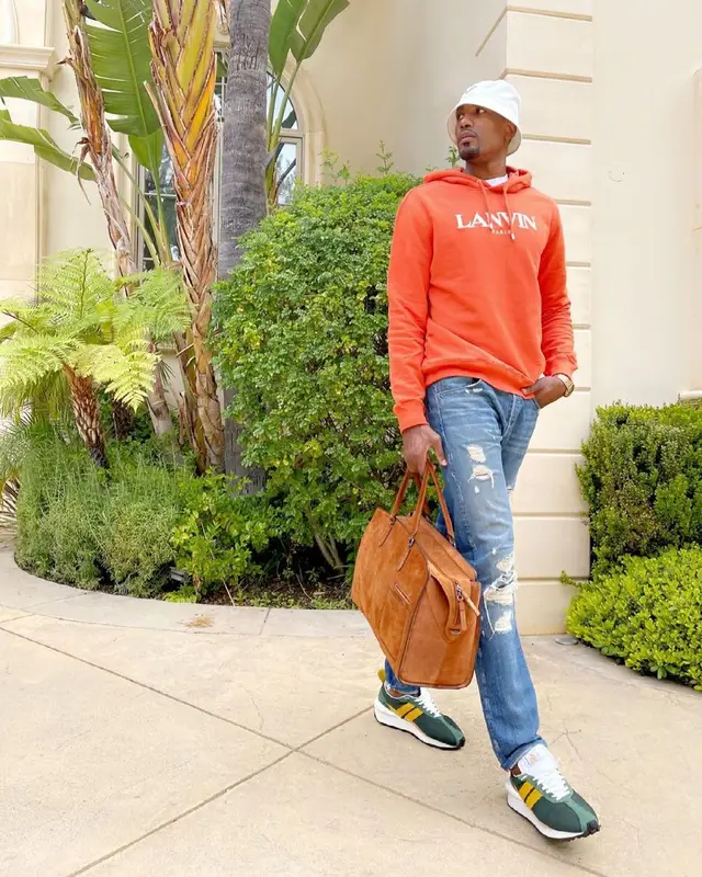 Serge Ibaka outfit in Lanvin, 3x1, and Prada, 2021