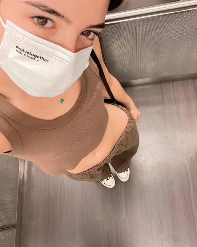 Charli D'Amelio outfit in Converse, Balenciaga, and Evolve Together, 2021
