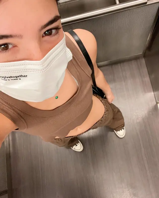Charli D'Amelio outfit in Converse, Balenciaga, and Evolve Together, 2021