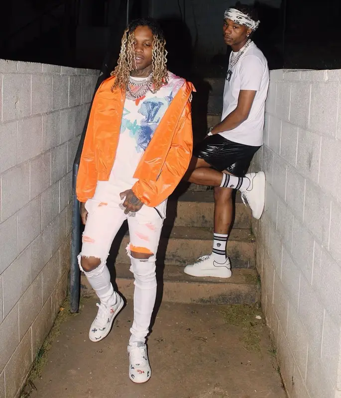 Lil Durk outfit in Dior, Louis Vuitton, and Kenny Scharf, 2021
