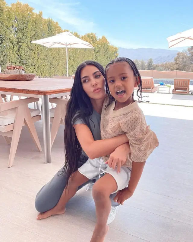 Kim Kardashian outfit in Skims, Yeezy, and Vans, 2021