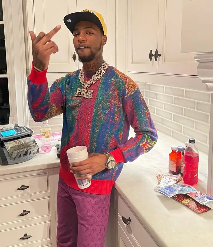 Key Glock outfit in Louis Vuitton, Jordan, and New Era, 2021