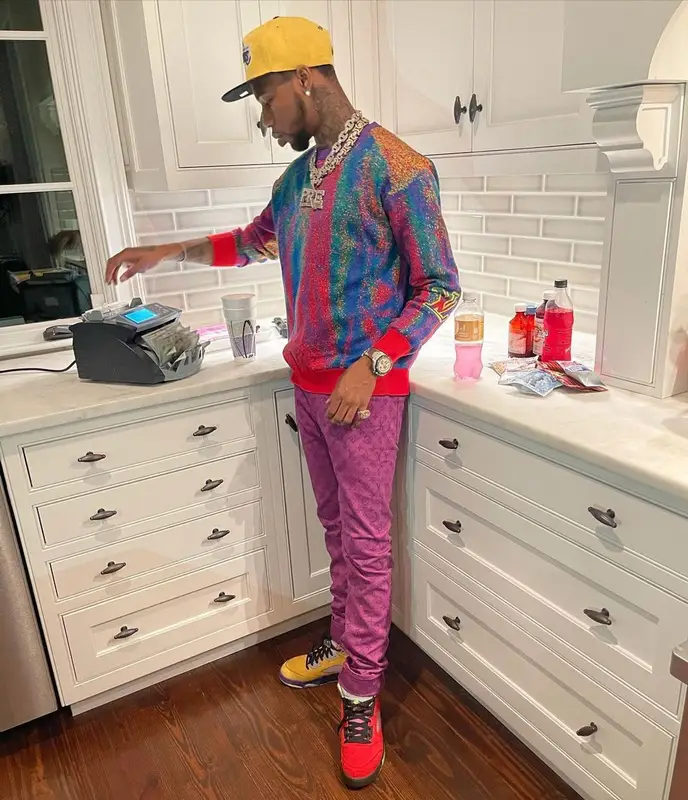 Key Glock outfit in Louis Vuitton, Jordan, and New Era, 2021