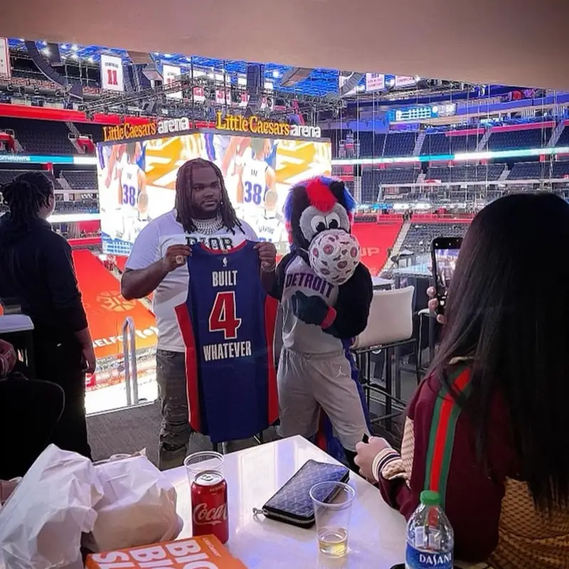 Tee Grizzley outfit in Dior, Amiri, and Kenny Scharf, 2021