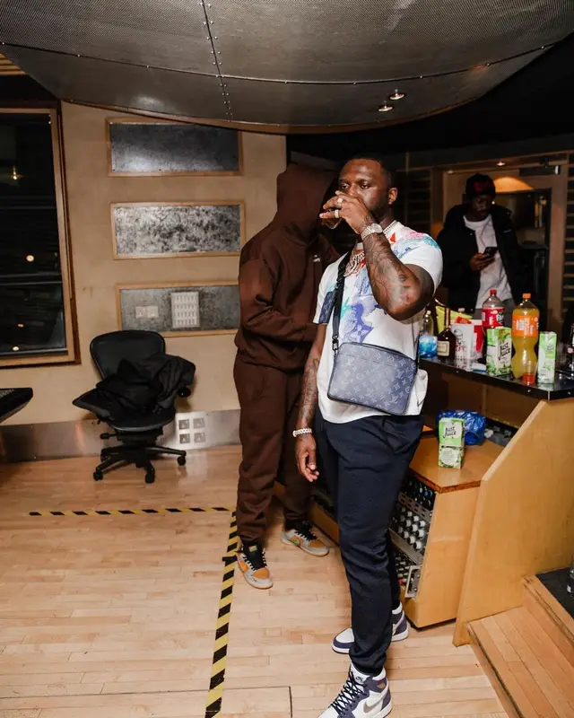 Headie One outfit in Louis Vuitton and Nike, 2021