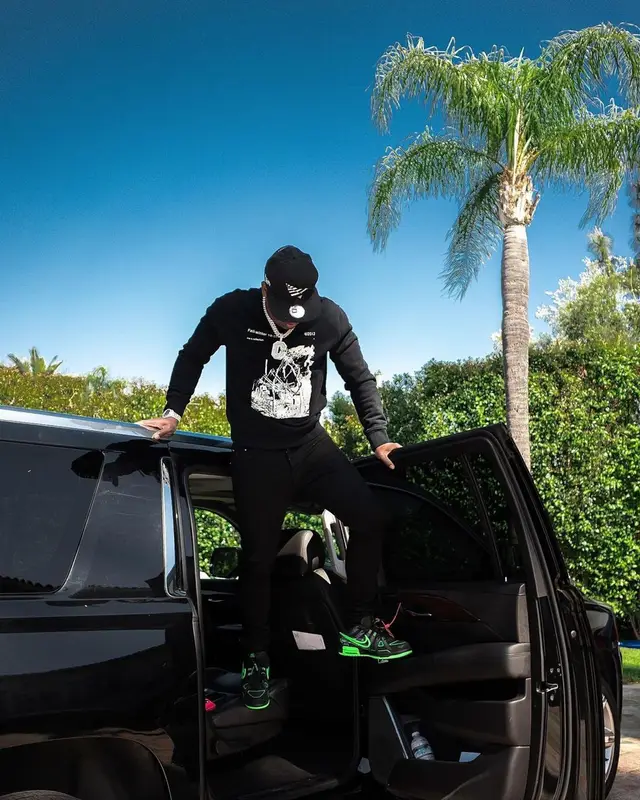 Yo Gotti outfit in Off-White, Nike, and Paper Planes, 2021