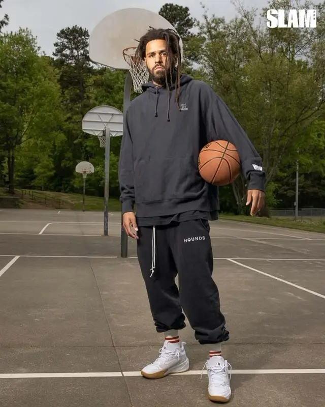 J. Cole outfit in Gallery Dept., Puma, and Spalding, 2021
