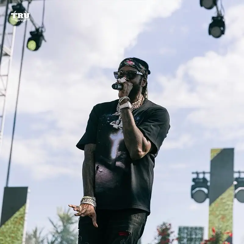 2 Chainz outfit in Amiri, Supreme, and Louis Vuitton, 2021