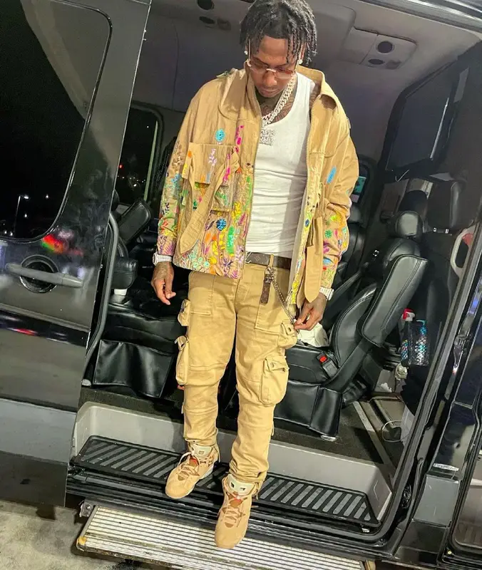 Moneybagg Yo outfit in Louis Vuitton, Amiri, and Cartier, 2021