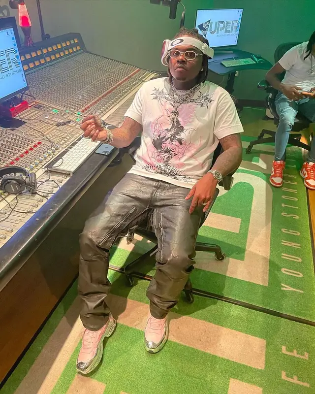 Gunna outfit in Givenchy, Cartier, and Oakley, 2021