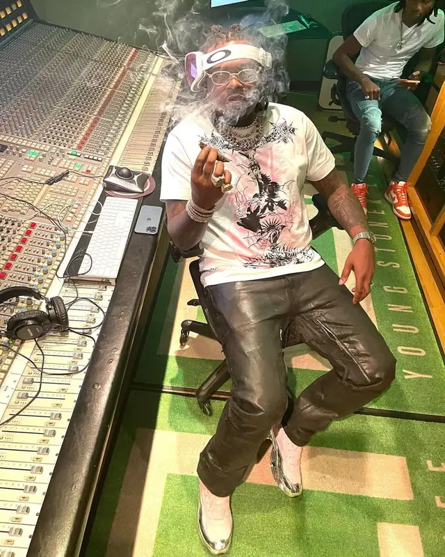 Gunna outfit in Givenchy, Cartier, and Oakley, 2021