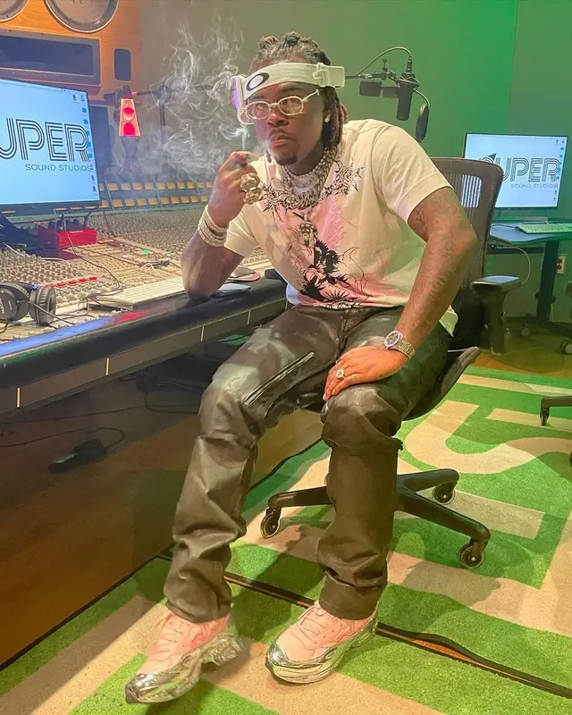 Gunna outfit in Givenchy, Cartier, and Oakley, 2021
