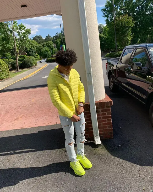 Mikey outfit in Stone Island, Burberry, and Balenciaga, 2021