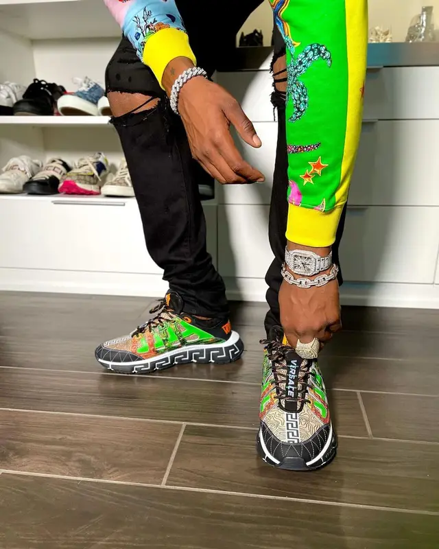 CJ So Cool outfit in Versace, Amiri, and Louis Vuitton, 2021
